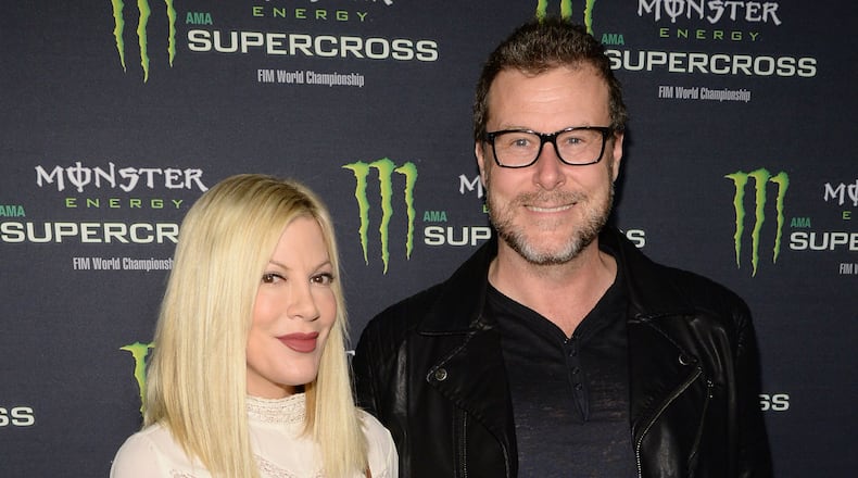 ANAHEIM, CA - JANUARY 23: Actors Tori Spelling (L) and Dean McDermott attend Monster Energy Supercross Celebrity Night at Angel Stadium of Anaheim on January 23, 2016 in Anaheim, California. (Photo by Michael Kovac/Getty Images for Feld Entertainment)