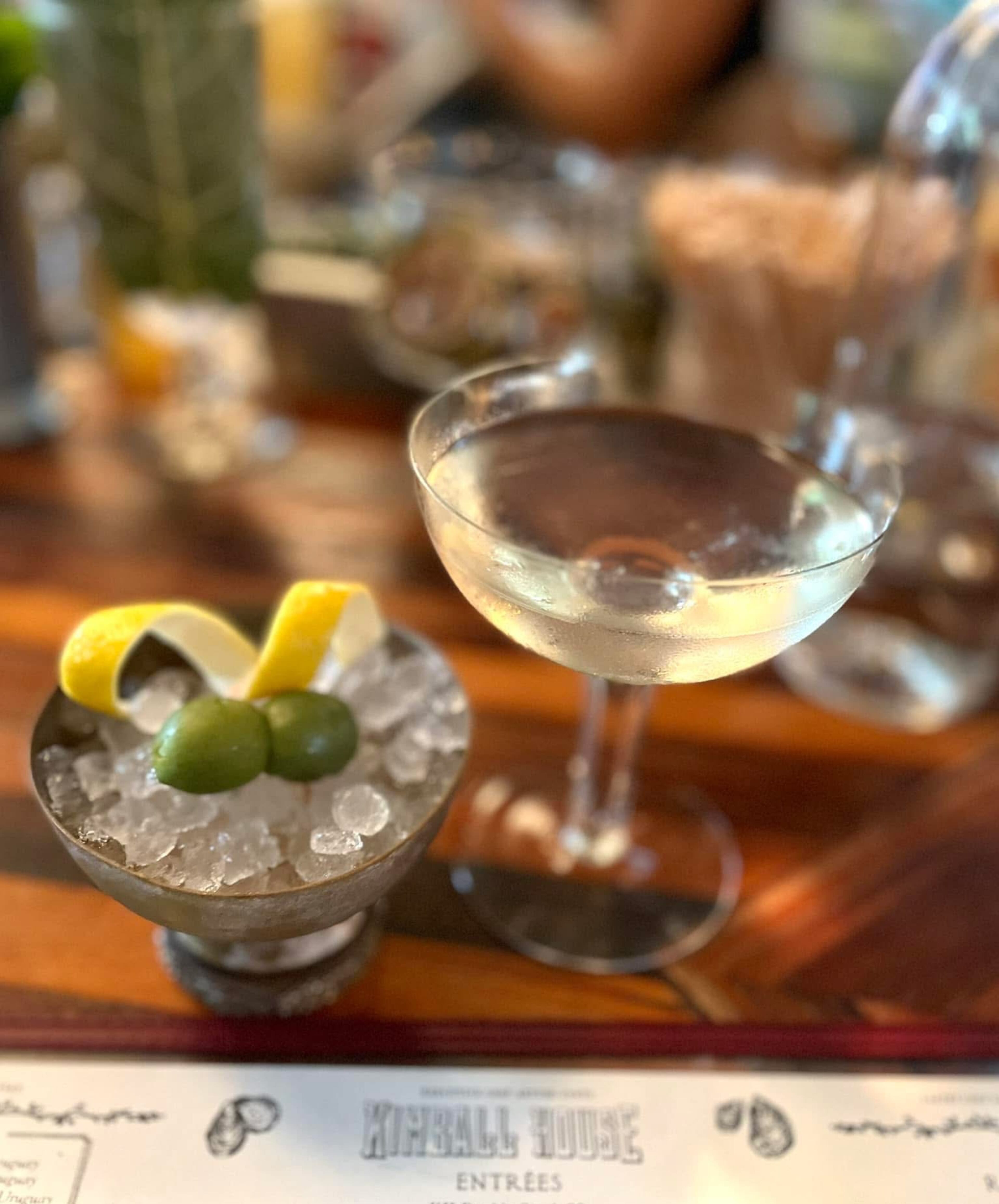 The Kimball House martini, which comes with house-cured olives and a lemon twist, might be the best you will ever try. (Angela Hansberger for the AJC)