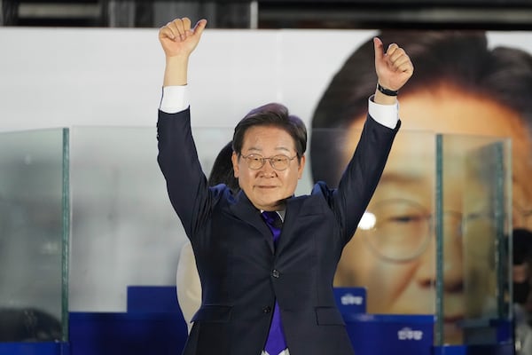 South Korea's Democratic Party's presidential candidate Lee Jae-myung, gestures as his supporters gather outside of the National Assembly in Seoul, South Korea, Wednesday, June 4, 2025. (AP Photo/Lee Jin-man)
