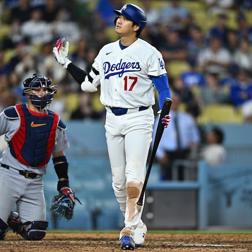 Los Angeles Dodgers' Shohei Ohtani (17) reacts after taking a strike during the 10th inning of a baseball game against the St. Louis Cardinals, Wednesday, Sept. 2, 2026, in Los Angeles. (AP Photo/William Liang)
