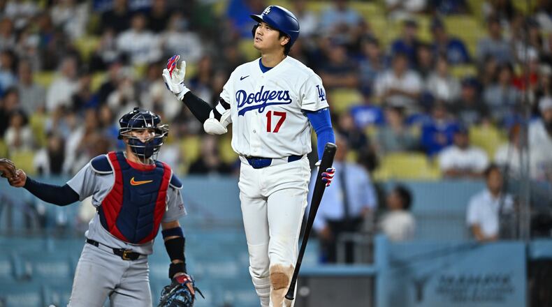 Los Angeles Dodgers' Shohei Ohtani (17) reacts after taking a strike during the 10th inning of a baseball game against the St. Louis Cardinals, Wednesday, Sept. 2, 2026, in Los Angeles. (AP Photo/William Liang)