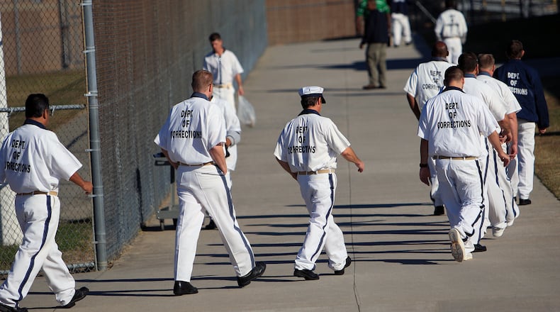 Federal immigration authorities are targeting over 1,200 Georgia prisoners for possible deportation according to the State Corrections Department. State Correction officials don't track the immigration status of their inmates, so it is unknown whether these prisoners are in the country illegally. But the federal government has issued detainers for the state prisons to hold these offenders for up to 48 hours after they have completed their sentences. We visit Phillips State Prisons while inmates are making their way to the cafeteria Thursday, October 27, 2011. Vino Wong vwong@ajc.com