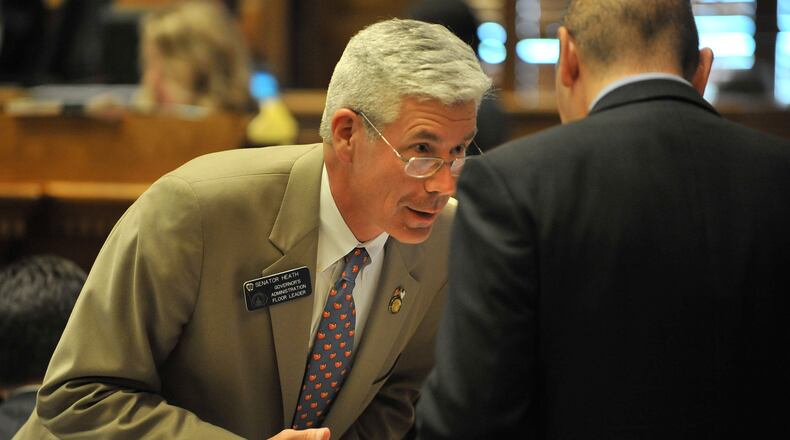 100427  Atlanta : Sen. Bill Heath (left) confers with  Sen. Mitch Seabaugh during the second to last day of the 2010 Legislative session at the state Capitol in Atlanta. Tuesday, April 27, 2010. Hyosub Shin, hshin@ajc.com