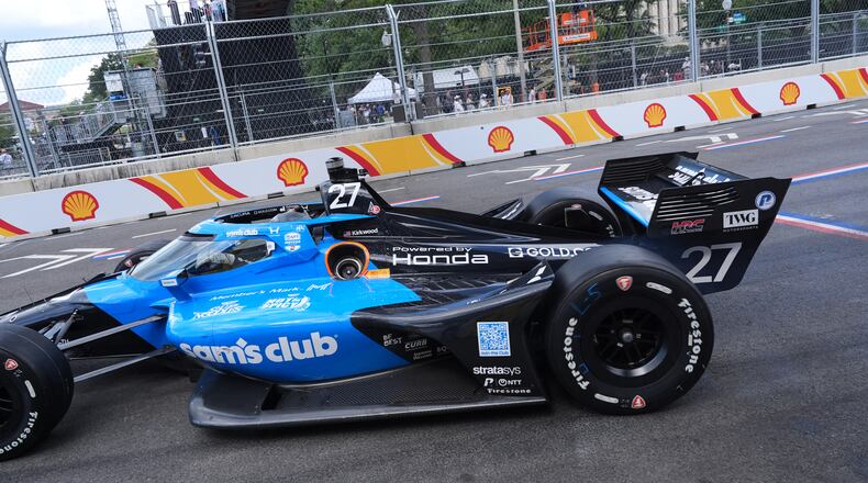 Kyle Kirkwood (27) makes a pit stop for gas during the IndyCar Freedom 250 Grand Prix auto race in Washington, Sunday, Aug. 23, 2026. (AP Photo/Alex Brandon)