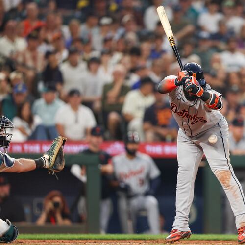 Detroit Tigers' Gleyber Torres is hit by a pitch in the eighth inning of a baseball game against the Seattle Mariners, Wednesday, Aug. 5, 2026, in Seattle. (AP Photo/Kevin Ng)