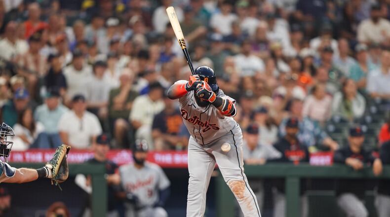 Detroit Tigers' Gleyber Torres is hit by a pitch in the eighth inning of a baseball game against the Seattle Mariners, Wednesday, Aug. 5, 2026, in Seattle. (AP Photo/Kevin Ng)