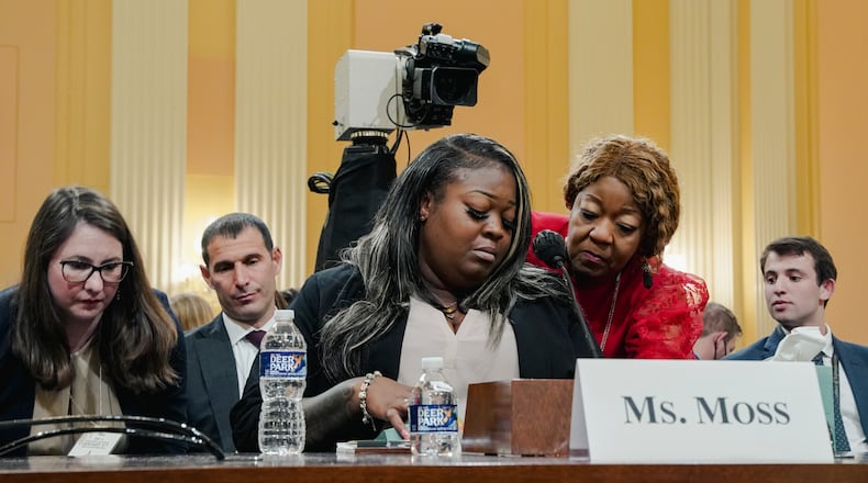 Former Georgia election worker Wandrea ArShaye Moss, left, is comforted by her mother, Ruby Freeman, as she testifies Tuesday during the fourth hearing held by the House committee investigating the Jan. 6, 2021, attack on the Capitol. (Shuran Huang/The New York Times)