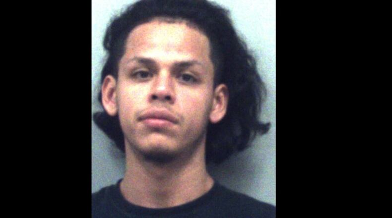 Eli Barojas Ramirez has been charged with criminal trespass, gang activity and 10 counts of aggravated assault.