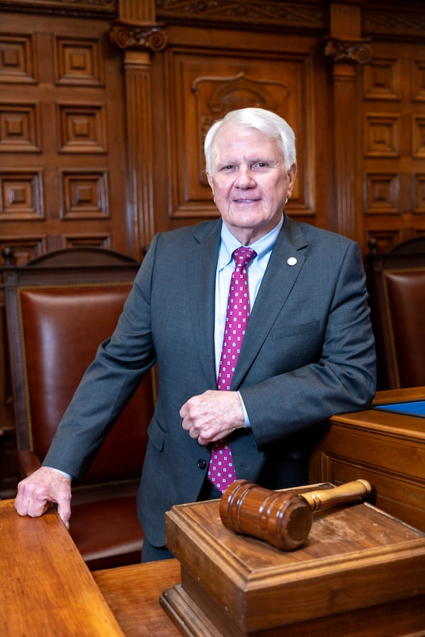 House Speaker Jon Burns, R-Newington, poses for a portrait at the rostrum of the House of Representatives in Atlanta on Thursday, February 26, 2026, as part of this year’s “best-dressed lawmakers” list. (Arvin Temkar/AJC)