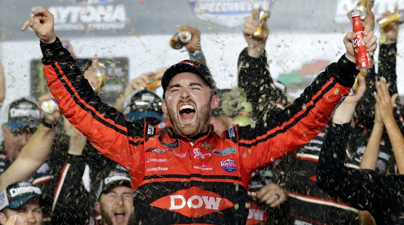 Austin Dillon celebrates in Victory Lane after winning the NASCAR Daytona 500 Cup series auto race at Daytona International Speedway in Daytona Beach, Fla., Sunday, Feb. 18, 2018. (AP Photo/Chuck Burton)