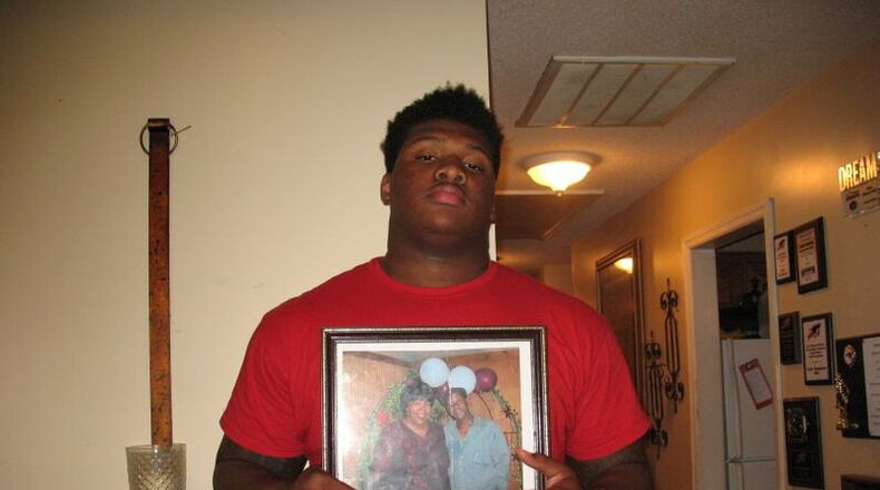 Trent Thompson’s grandparents, Eddie Lee and Shirley Flewellen, both died in recent years. But their lessons about work and life remain a powerful influence on Thompson, who entered UGA in June as the 247Sports composite No. 1-rated college prospect in America. (AJC / CHIP TOWERS)