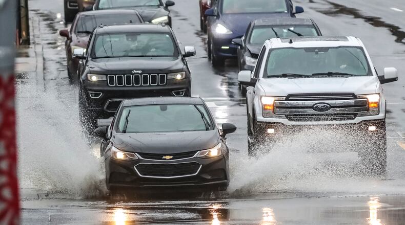 Severe weather, including waves of storms and possible flooding, are expected to roll into North Georgia Sunday night and continue through the day on Monday. (John Spink / John.Spink@ajc.com)
