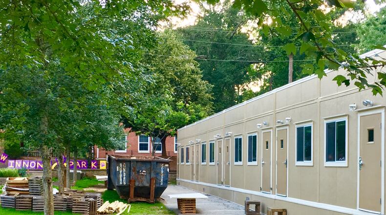 The four new modular units at Decatur’s Winnona Park Elementary, which eliminates roughly 80 percent of the school’s parking. The school, which reached an all-time enrollment high of 484 last year, now has 8 of City Schools Decatur’s total 30 trailers. Bill Banks for the AJC.