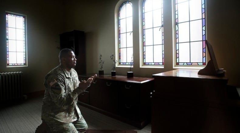 Army Lt. Col. Khallid Shabazz prays five time a day as an Islamic chaplain at the Main Post Chapel on JBLM on Wednesday, Feb. 22, 2017. (Lui Kit Wong/Tacoma News Tribune/TNS)