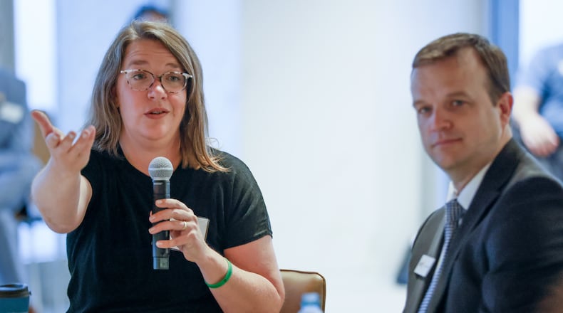 Skylar Olsen (left), chief economist for Zillow', at a roundtable event at the Metro Atlanta Chamber on Friday. On her right is Ian Wyatt, the Chamber's chief economist. Steve Schaefer/steve.schaefer@ajc.com)