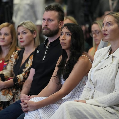 ADDS NAMES - Victims of Jeffrey Epstein sit in the front row, from left, Liz Stein, Dani Bensky, Sky Roberts, brother of a victim, Amanda Roberts, sister-in-law of a victim and Lara Blume McGee, as Democratic U.S. Senate candidate Texas state Rep. James Talarico speaks during an event in Dallas, Thursday, Sept. 10, 2026. (AP Photo/Jacquelyn Martin)