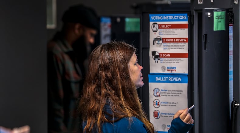 The May 21, 2024 general primary and nonpartisan election in metro Atlanta will include a number of local referendums and issues. In this photo:: Ashley Parker voted on Friday, Nov. 4, 2022 at the Joan P. Garner Library at Ponce De Leon located at 980 Ponce De Leon Avenue NE in Atlanta. (John Spink / John.Spink@ajc.com)