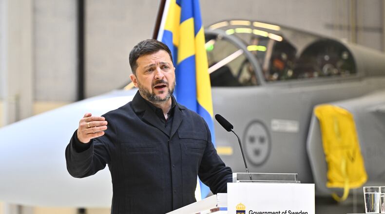 Ukraine's President Volodymyr Zelenskyy and Sweden's Prime Minister Ulf Kristersson, not seen, give a joint news conference at the F16 air flotilla in Uppsala, Sweden, Thursday, May 28, 2026. (Christine Olsson/TT News Agency via AP)