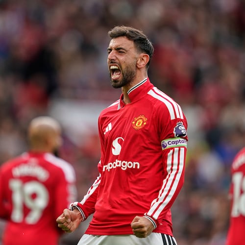 Manchester United's Bruno Fernandes celebrates after scoring his side's third goal during the English Premier League soccer match between Manchester United and Ipswich Town in Manchester, England, Sunday, Aug. 30, 2026. (AP Photo/Dave Thompson)