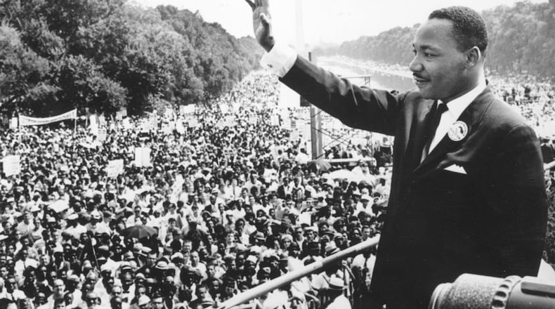 Black American civil rights leader Martin Luther King Jr. addresses crowds during the March On Washington at the Lincoln Memorial, Washington DC, where he gave his "I Have A Dream" speech. (Photo by Central Press/Getty Images/TNS)
