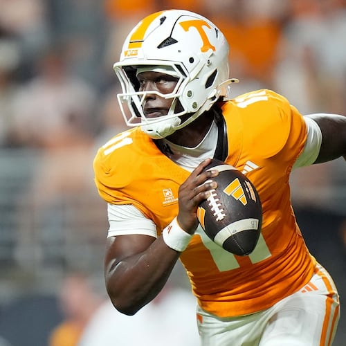 Tennessee quarterback Faizon Brandon runs the ball during the first half of an NCAA college football game against Kennesaw State, Saturday, Sept. 19, 2026, in Knoxville, Tenn. (AP Photo/Camden Hall)