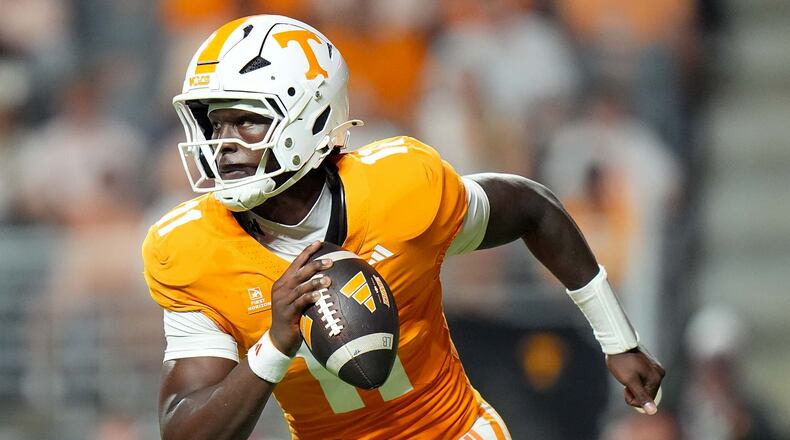 Tennessee quarterback Faizon Brandon runs the ball during the first half of an NCAA college football game against Kennesaw State, Saturday, Sept. 19, 2026, in Knoxville, Tenn. (AP Photo/Camden Hall)