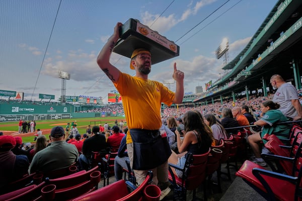 A vendor sells lemonade at Fenway Park, Monday, June 2, 2025, in Boston. (AP Photo/Robert F. Bukaty)