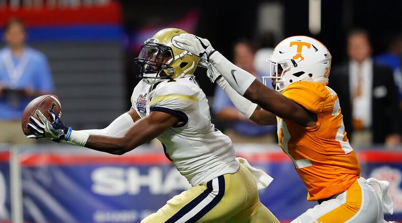 ATLANTA, GA - SEPTEMBER 04: Qua Searcy #1 of the Georgia Tech Yellow Jackets pulls in this reception against Micah Abernathy #22 of the Tennessee Volunteers at Mercedes-Benz Stadium on September 4, 2017 in Atlanta, Georgia. (Photo by Kevin C. Cox/Getty Images)