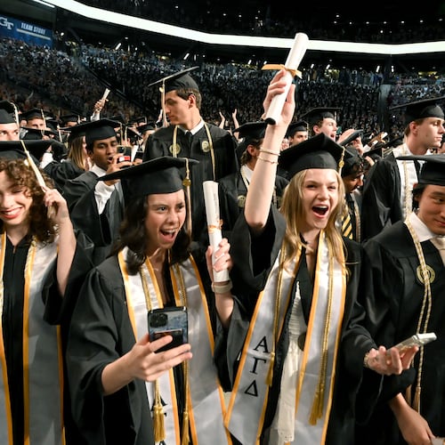 Georgia Tech graduates celebrate during spring commencement in May, and the school's growing enrollment helped contribute to the University System of Georgia recording record highs for degrees conferred this fiscal year. (Hyosub Shin/AJC)