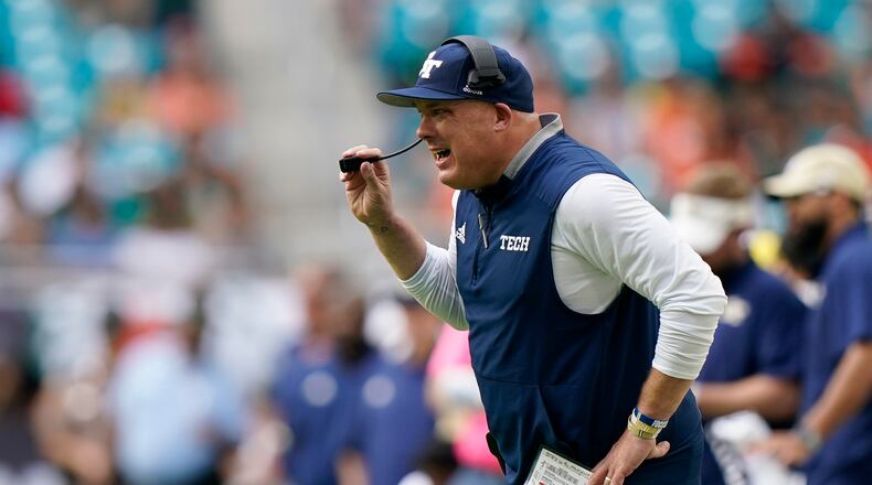 Georgia Tech head coach Geoff Collins calls out to players during the second half of an NCAA college football game against Miami, Saturday, Nov. 6, 2021, in Miami Gardens, Fla. (AP Photo/Wilfredo Lee)