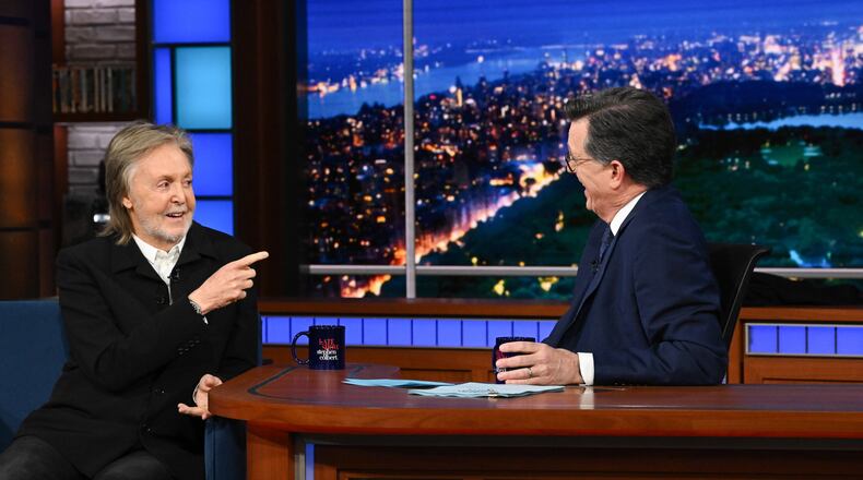 This image released by CBS shows Paul McCartney, left, with host Stephen Colbert during the final episode of "The Late Show with Stephen Colbert" in New York on Thursday, May 21, 2026. (Scott Kowalchyk/CBS via AP)
