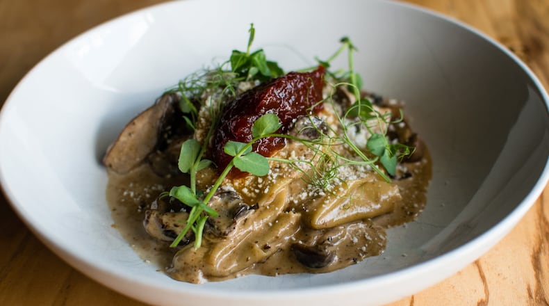 Silk Handkerchief Pasta, which comes with roasted wild mushrooms, porcini cream, tomato marmalade and cotija cheese, has been on the menu since the beginning at Better Half. CONTRIBUTED BY HENRI HOLLIS