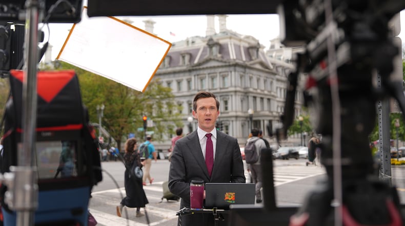 Vaughn Hillyard, White House correspondent for MS NOW, does a report from near the White House, Monday, Sept. 21, 2026, in Washington. (AP Photo/Mark Schiefelbein)