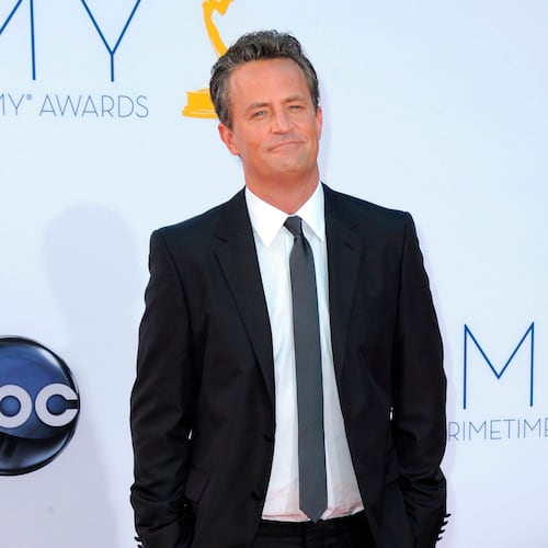 FILE - Actor Matthew Perry arrives at the 64th Primetime Emmy Awards in Los Angeles on Sept. 23, 2012. (Photo by Jordan Strauss/Invision/AP, File)