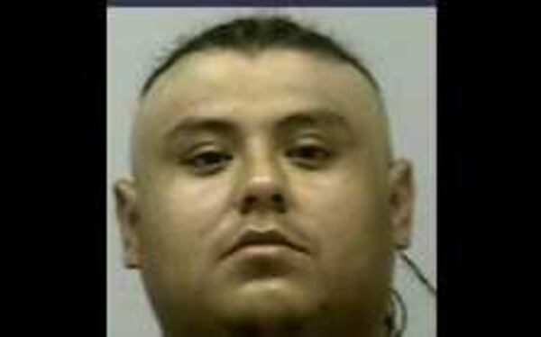 Earlier mug shot of Enrique Carrera (Credit: Gwinnet County Police Department)