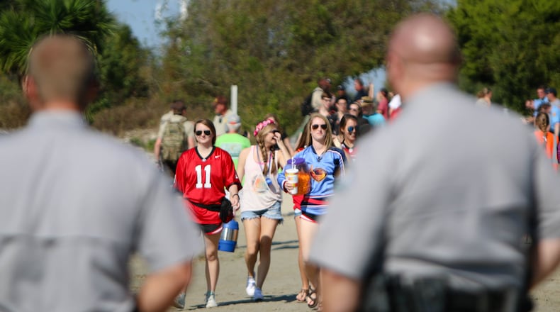 Frat beach atendees arrive at the beach on Oct. 30, 2015, in St. Simons Georgia. Glynn County Police Chief MAtt Doering said he "doubled his compliment of officers this year," and that they will be in both uniform and plain clothes. (Photo by Taylor Carpenter/Red and Black)