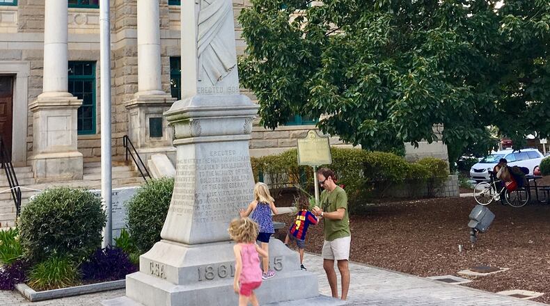 This Confederate monument has been a familiar Decatur sight for generations, but elected city leaders want it gone. (Bill Banks for the AJC)