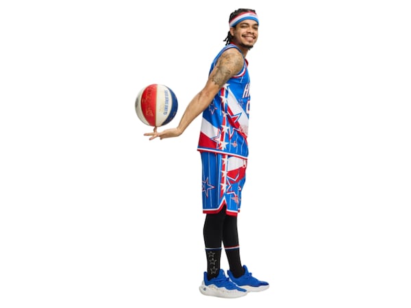 Rochell "Wham" Middleton grew up playing basketball in Gwinnett County. Now, he's a Harlem Globetrotter.