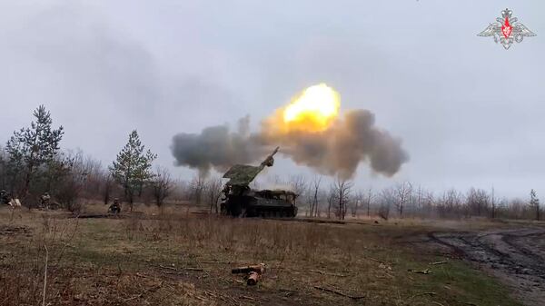 In this photo taken from video distributed by Russian Defense Ministry Press Service on Sunday, March 30, 2025, a Russian Army 2S5 howitzer Giatsint-S fires towards Ukrainian positions in Ukraine. (Russian Defense Ministry Press Service via AP)