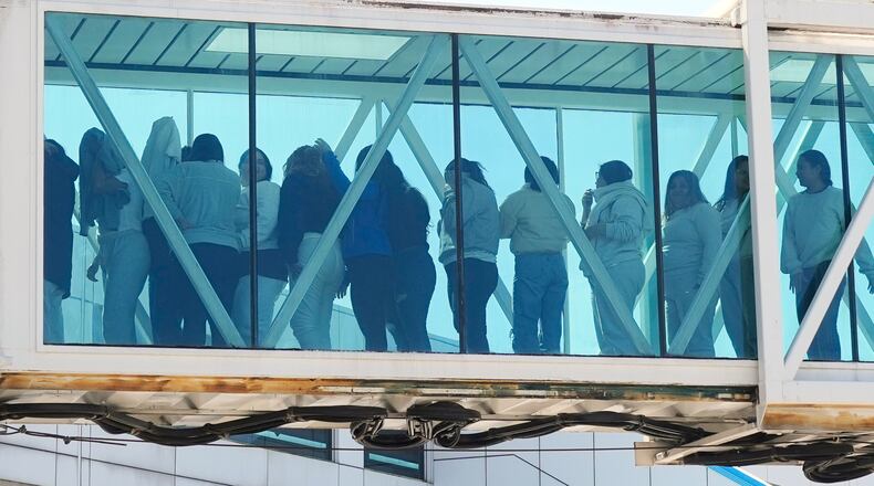 Venezuelans deported from the United States deplane at Simon Bolivar International Airport in Maiquetia, Venezuela, Monday, Jan. 19, 2026. (AP Photo/Matias Delacroix)