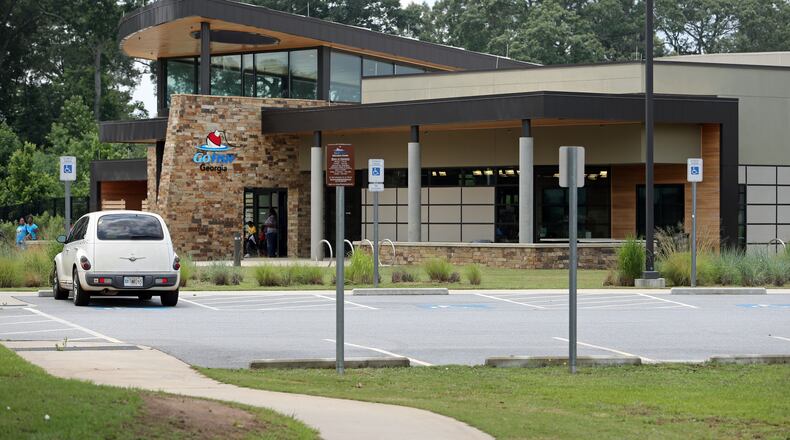 An automobile is shown parked outside of the Go Fish Center Friday afternoon in Perry, Ga., June 7, 2013. Georgia taxpayers are spending more than $1 million a year on a fishing promotion attraction that is only open to the public three days a week and has a two-year track record of poor attendance. JASON GETZ / JGETZ@AJC.COM