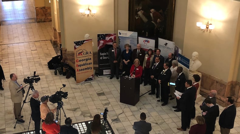 Virginia Galloway, regional director for the Faith & Freedom Coalition, leads a press conference Tuesday in the Georgia Capitol rotunda to seek support for religious liberty legislation. ALAA ELASSAR / AJC