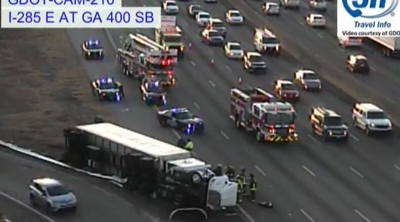 An overturned tractor-trailer has caused heavy delays on eastbound I-285 at Ga. 400. (Credit: Georgia Department of Transportation)