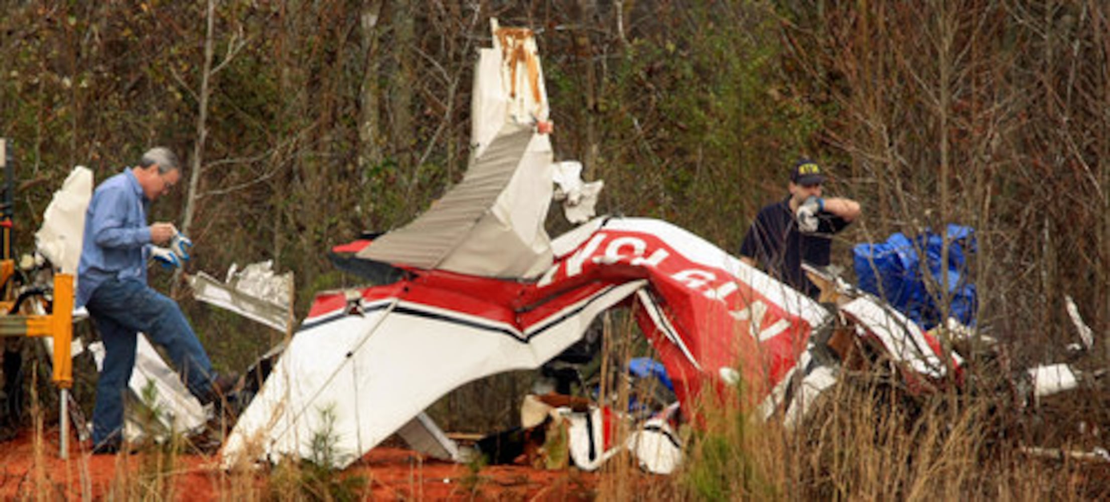 Crews search Carrollton crash site