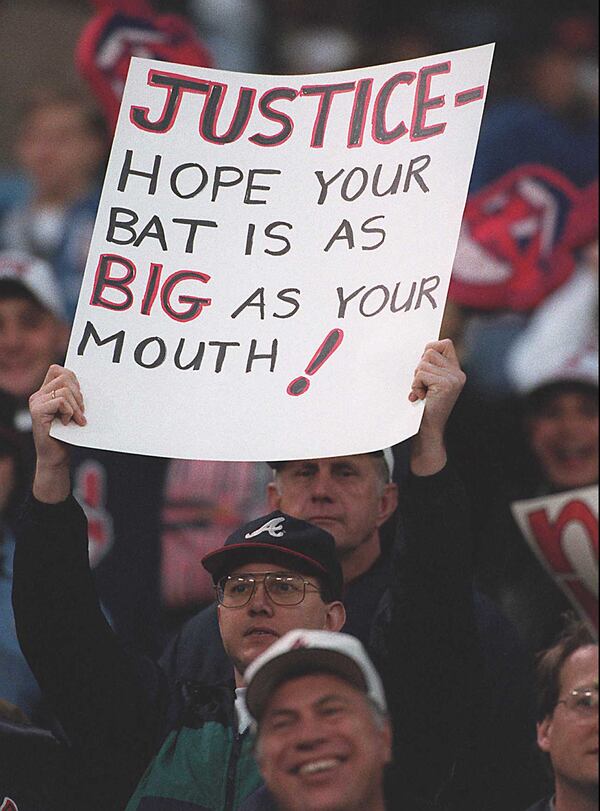 OCTOBER 28, 1995 ATLANTA Thomas Marshall of Atlanta holds up a sign indicating his anti-David Justice sentiments Saturday night. Justice on Friday accused the Atlanta fans of not being very supportive. JONATHAN NEWTON/AJC STAFF