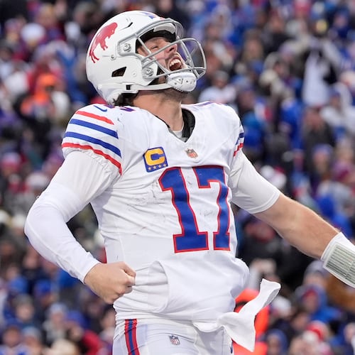 Buffalo Bills quarterback Josh Allen celebrates after scoring a touchdown against the Tampa Bay Buccaneers during the second half of an NFL football game, Sunday, Nov. 16, 2025, in Orchard Park, N.Y. (AP Photo/Carolyn Kaster)
