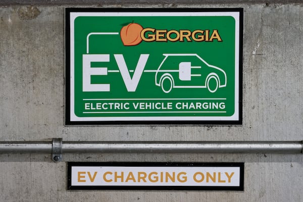 An electric vehicle charging station sign in Atlanta as seen on Friday, August 26, 2022.