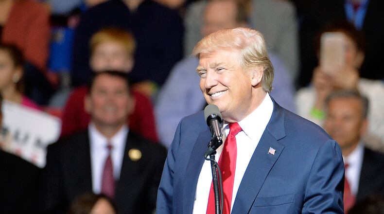 FAYETTEVILLE, NC - DECEMBER 06: President-elect Donald Trump addresses an audience at Crown Coliseum on December 6, 2016 in Fayetteville, North Carolina. Trump took time off from selecting the cabinet for his incoming administration to celebrate his victory in the general election. (Photo by Sara D. Davis/Getty Images)