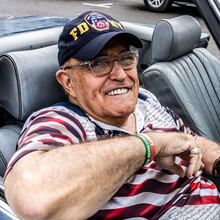 Rudy Giuliani sits outside a polling place in Palm Beach, Fla., on Tuesday, Nov. 5, 2024, in a Mercedes-Benz convertible that appears to be the vehicle he had been ordered to turn over to former Fulton County election workers Ruby Freeman and Shaye Moss. He has since surrendered the Mercedes but not the title to the car, it was disclosed at a recent court hearing. (Mark Peterson/NYT)