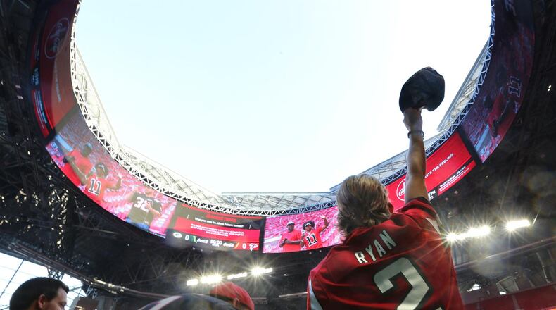 September 17, 2017 Atlanta: Colton Holder, Snellville, waves his cap beneath the open roof of Mercedes-Benz Stadium as the Falcons prepare to play the Packers in a NFL football game on Sunday, September 17, 2017, in Atlanta. Curtis Compton/ccompton@ajc.com